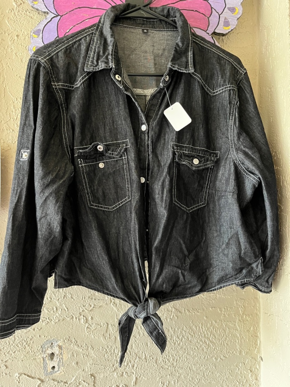 Black Tie-Front Denim Shirt Jacket with graphic on the back.